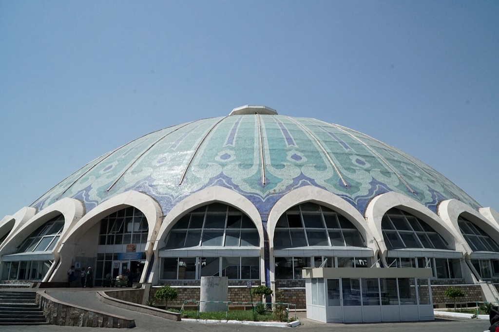 The turquoise tiled dome of Chorsu Bazaar in Tashkent, a Soviet modernist market hall