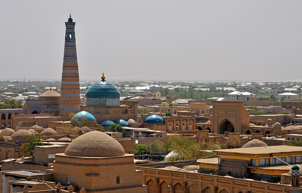 Rooftops, domes and the Islam Khoja minaret seen across Itchan Kala in Khiva